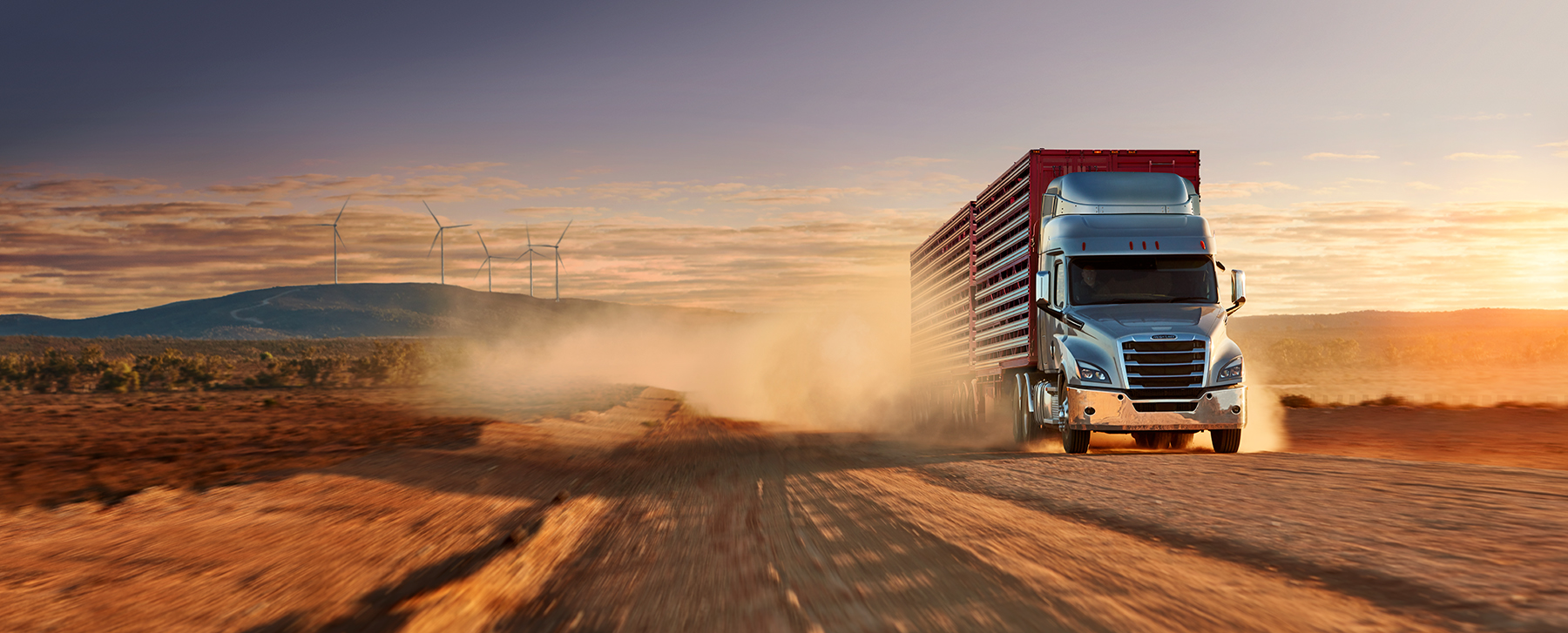 freightliner on a dusty road in australia