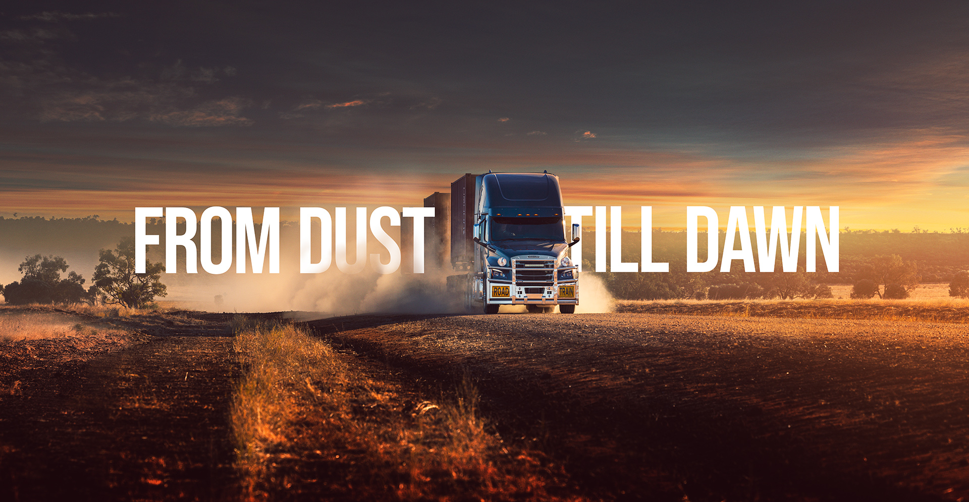 retouched image of a cascadia truck on a dusty road