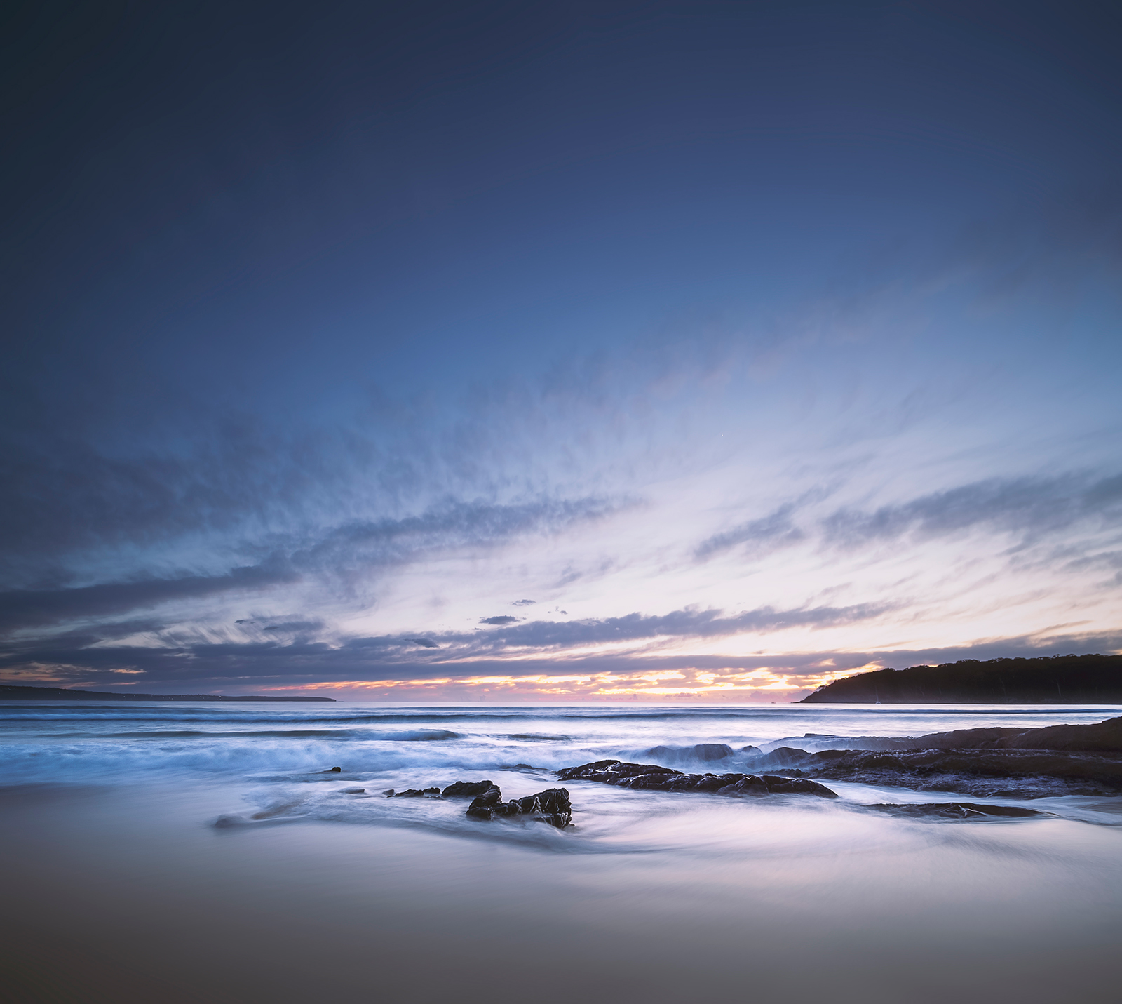 seascape photgraph of beach a dawn